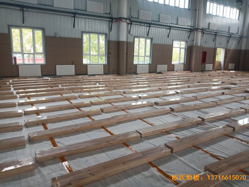 新疆克拉瑪依市獨山子虹園小區體育館體育地板施工案例