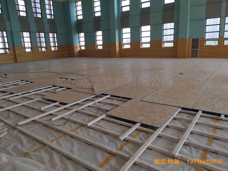 武漢廣阜屯小學(xué)清江錦城分校籃球館運(yùn)動(dòng)地板施工案例2